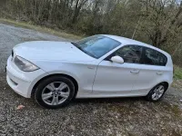 Używany BMW 116 122 KM (89 kW) 2008 Biały Hatchback