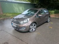 Gebraucht Kia Rio 110 PS (80 kW) 2013 Braun Kleinwagen