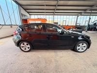 Second-hand BMW 116 116 CP (85 kW) 2009 Negru Hatchback