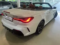 Gebraucht BMW 440 387 PS (284 kW) 2023 Mineralweiss metallic Cabrio