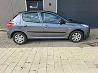 Gebraucht Peugeot 206+ 73 PS (53 kW) 2011 Grau Kleinwagen