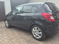 Używany Opel Corsa 87 KM (63 kW) 2011 Czarny Hatchback