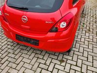 Gebraucht Opel Corsa Edition 69 PS (50 kW) 2011 Rot Kleinwagen