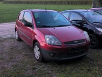 Używany Ford Fiesta 90 KM (66 kW) 2007 Pomarańczowy Hatchback