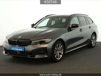Gebraucht BMW 330e Sport Line 252 PS (185 kW) 2022 Mineralgrau metallic Kombi