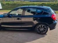 Gebraucht BMW 116 122 PS (89 kW) 2007 Schwarz Kleinwagen