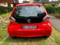 Gebraucht Toyota Aygo 68 PS (50 kW) 2010 Rot Kleinwagen