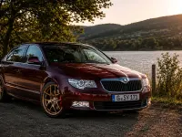 Używany Skoda Superb 160 KM (117 kW) 2009 Czerwony Sedan/Limuzyna