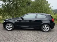 Gebraucht BMW 116 122 PS (89 kW) 2010 Schwarz Kleinwagen