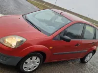 Gebraucht Ford Fiesta 75 PS (55 kW) 2009 Rot Kleinwagen