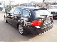 Gebraucht BMW 320 Exclusive 184 PS (135 kW) 2011 Schwarz Kombi