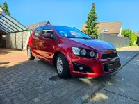 Gebraucht Chevrolet Aveo LT 101 PS (74 kW) 2011 Rot Limousine