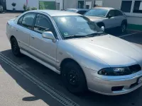 Gebraucht Mitsubishi Carisma 105 PS (77 kW) 2004 Grau Limousine
