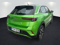 Gebraucht Opel Mokka Elegance 101 PS (74 kW) 2024 Lackierung matcha green/typ au SUV