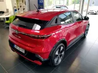 Używany Renault Megane E-Tech Evolution 160 kW (218 KM) 2023 Czerwony Sedan/Limuzyna