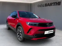 Używany Opel Mokka-e Elegance 100 kW (136 KM) 2024 Czerwony SUV