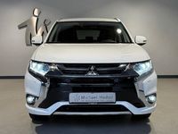 Gebraucht Mitsubishi Outlander P-HEV Plus 203 PS (149 kW) 2017 Weiß SUV