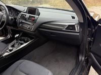 Gebraucht BMW 114 102 PS (75 kW) 2012 Schwarz Kleinwagen