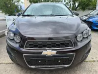 Usado Chevrolet Aveo LT 101 HP (74 kW) 2013 Castanho Citadino