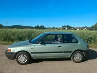Gebraucht Mazda 323 73 PS (53 kW) 1991 Blau Kleinwagen