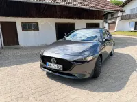 Używany Mazda 3 186 KM (136 kW) 2023 Szary Sedan/Limuzyna