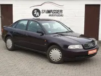 Używany Audi A4 101 KM (74 kW) 1995 Purpurowy Sedan/Limuzyna