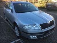 Second-hand Skoda Octavia Ambiente 105 CP (77 kW) 2008 Argintiu Break