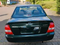 Gebraucht Mazda 323 88 PS (64 kW) 1998 Grün Limousine