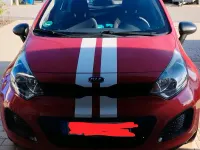 Używany Kia Rio 85 KM (62 kW) 2013 Czerwony Hatchback