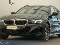 Gebraucht BMW 320e 204 PS (150 kW) 2022 Schwarz uni Kombi