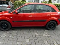 Używany Kia Rio 90 KM (66 kW) 2009 Czerwony Hatchback