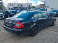 Second-hand Mercedes E200 136 CP (100 kW) 2006 Negru Berlinǎ