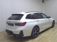 Gebraucht BMW 330e M Sport 184 PS (135 kW) 2022 Mineralweiss metallic Kombi