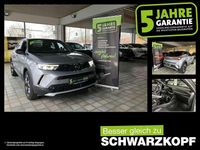 Gebraucht Opel Mokka-e Ultimate 100 kW (136 PS) 2022 Kontrast grau/quarz silber SUV