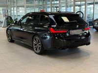 Gebraucht BMW 340 374 PS (275 kW) 2024 Saphirschwarz Kombi