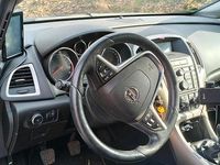 Gebraucht Opel Astra 130 PS (95 kW) 2013 Grün Kombi