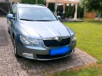 Używany Skoda Superb 200 KM (147 kW) 2012 Szary Kombi