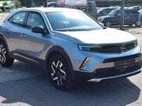Gebraucht Opel Mokka Elegance 131 PS (96 kW) 2023 Kontrast grau/quarz silber SUV
