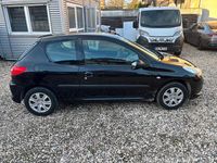 Gebraucht Peugeot 206+ 75 PS (55 kW) 2010 Schwarz Kleinwagen