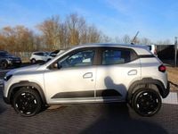 Gebraucht Dacia Spring Extreme 47 kW (65 PS) 2024 Diamantsilbergrau Kleinwagen