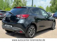 Używany Mazda 2 Nakama 90 KM (66 kW) 2016 Czarny Sedan/Limuzyna