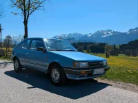 Używany Mazda 323 86 KM (63 kW) 1987 Niebieski Hatchback