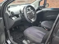 Gebraucht Chevrolet Spark 94 PS (69 kW) 2011 Schwarz Kleinwagen