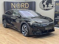 Gebraucht VW ID.7 Pro 210 kW (286 PS) 2023 Grenadillschwarz met (metallic) Kleinwagen