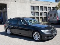 Gebraucht BMW 320 177 PS (130 kW) 2008 Schwarz Kombi