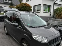 Gebraucht Ford Tourneo Courier Trend 101 PS (74 kW) 2018 Grau Van / Kleinbus