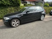 Gebraucht BMW 116 Lifestyle 116 PS (85 kW) 2011 Schwarz Kleinwagen