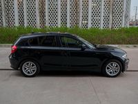 Gebraucht BMW 116 122 PS (89 kW) 2010 Schwarz Kleinwagen