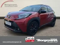 Gebraucht Toyota Aygo X Style 72 PS (52 kW) 2024 3u4)/ black mica (209) (rot SUV