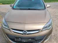 Second-hand Opel Astra 165 CP (121 kW) 2014 Maro Break